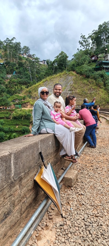 Family Relaxing on Ella Railway Hillside